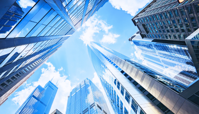 A cluster of soaring skyscrapers represents the future of wealth management.